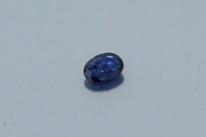 Oval sapphire on paper. 

Accompanied by...