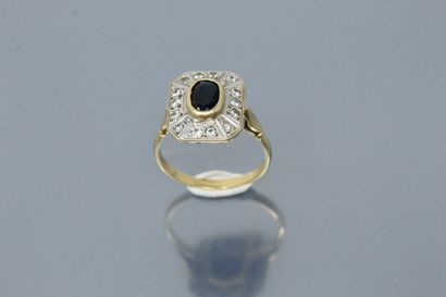 18K (750) yellow gold ring set with an oval...
