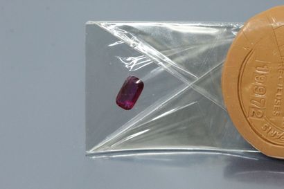 Oval ruby under seal. 
Accompanied by a certificate...