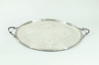 null CHRISTOFLE 

A silver plated serving tray with two handles decorated with flowers...