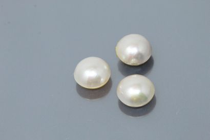Lot of three pearls half pearl half mother...