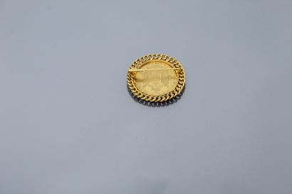 null 18k (750) yellow gold brooch set with a 50 franc Napoleon III (1857 A) coin....