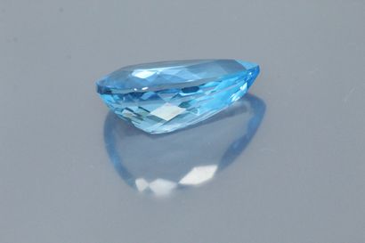 null Pear topaz on paper. 

Weight : 74.85 cts.