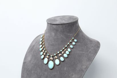 null Gold-plated metal necklace adorned with turquoise cabochons and small old-cut...