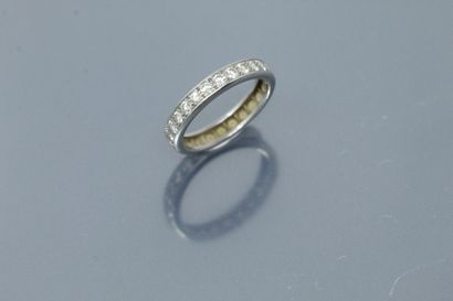 American wedding ring in platinum with diamonds....