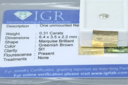  Diamant marquise "greenish brown" sous scellé. 
Accompagné d'un rapport de l'IGR...