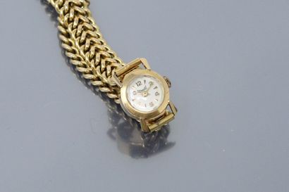 null DERMONT

Ladies' wristwatch, round case in 18k (750) yellow gold, cream dial,...