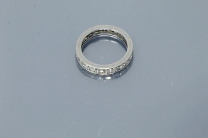 null American wedding band in platinum (dog's head hallmark) set with diamonds. 

Finger...