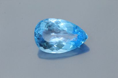 null Pear topaz on paper. 

Weight : 74.85 cts.