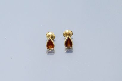 null Pair of 18k (750) yellow gold earrings set with citrine

Gross weight: 3.40...