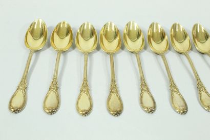  Twelve small silver spoons (Minerva mark) with vermeil, the handle decorated with...