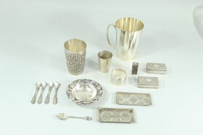 null 
Lot of silverware including :

- a napkin ring engraved "Agnès" with a frieze...