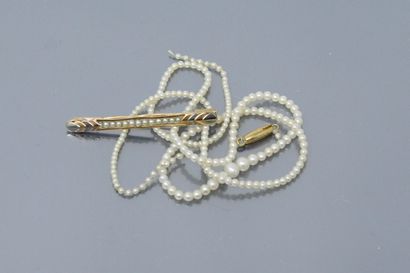 null 18K (750) gold barrette brooch set with a row of small cultured pearls, and...