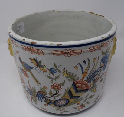 null A Rouen earthenware refreshment stand, decorated with a large horn fire, with...