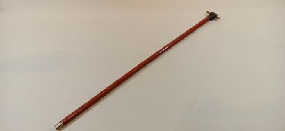 null Cane, pommel decorated with a closed hand holding a stick,

length: 84 cm