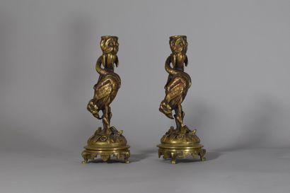 null A pair of ormolu candlesticks decorated with heron and small frogs

H: 21,5...