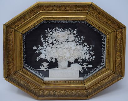 null 
Carved ivory representing a bouquet of flowers.

19th Century

Size: 24 x 30...