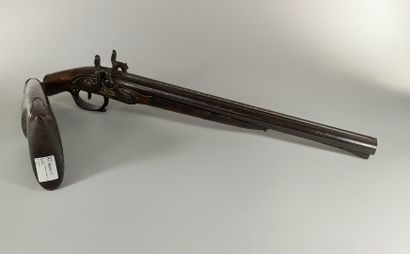 null Saddle rifle. 

Flintlock locks converted to percussion. Double barrel in table,...