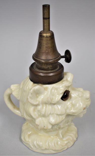 null 
Pigeon lamp in cream enamelled stoneware depicting a dog, eyes in colored glass.

Small...