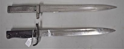 null Set of two German Ersatz bayonets. 

Fairly good condition (without scabbar...
