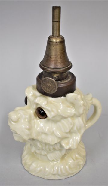 null 
Pigeon lamp in cream enamelled stoneware depicting a dog, eyes in colored glass.

Small...