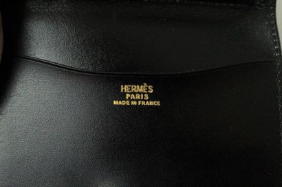 null HERMES 

Black leather notebook holder. 

Signed HERMES PARIS. 

(Mqs)

Size...