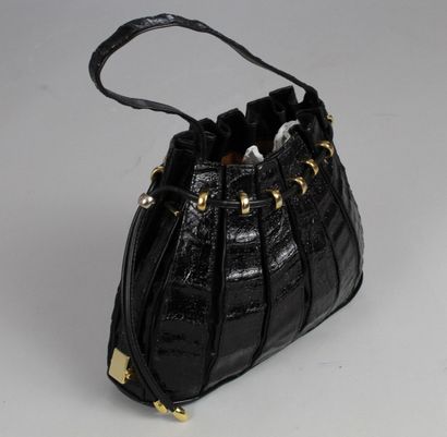  BOL-PERDIX 
 
Accordion bucket bag carried by hand in a black glazed crocodile style,...