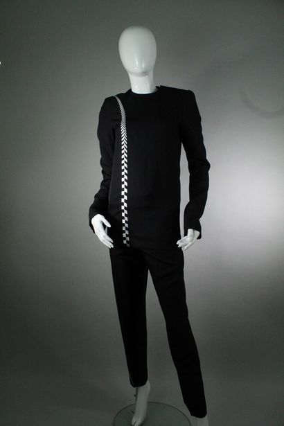 HAIDER ACKERMANN



Black outfit made of...