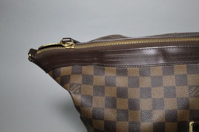 null 
LOUIS VUITTON



All Day" model travel bag, in checkerboard canvas and chocolate...