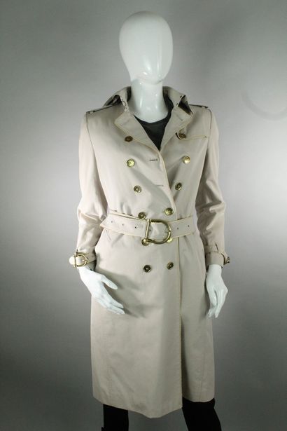 BURBERRY 
 
Beige trench coat in cotton canvas,...