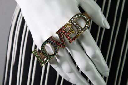 GUCCI 



Hand ring in gilded brass with...
