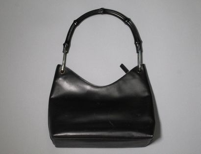  GUCCI 
Shoulder or hand bag in smooth black leather and bamboo handle emblematic...