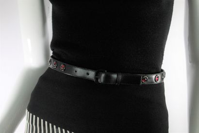 ANONYMOUS 
 
Black smooth leather belt with...