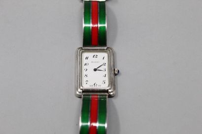 null GUCCI

Wristwatch, rectangular silver case, cream dial with Arabic numerals....