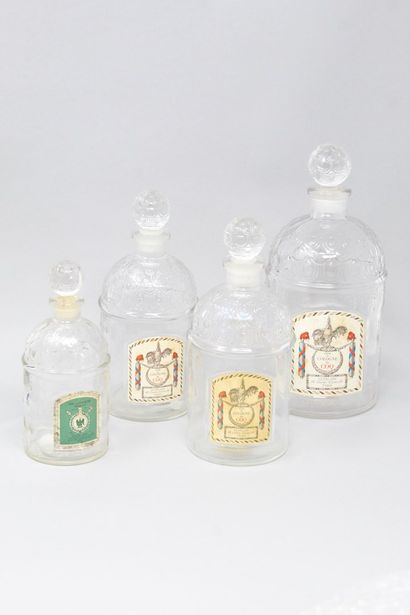  GUERLAIN 
Set of four glass bottles of Eau de Cologne du Coq (x3) and Eau de Cologne...