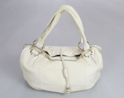 null CELINE 



Hand or shoulder bag "Boogie" model in cream snake and white calf....
