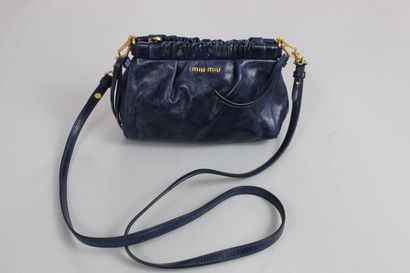 null MIU MIU 



Hand or shoulder bag (removable) in midnight blue leather with gathers,...