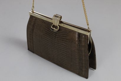 null ANONYMOUS 



Bag in tobacco reptile format purse, clasp flap jewelled.

Chain...