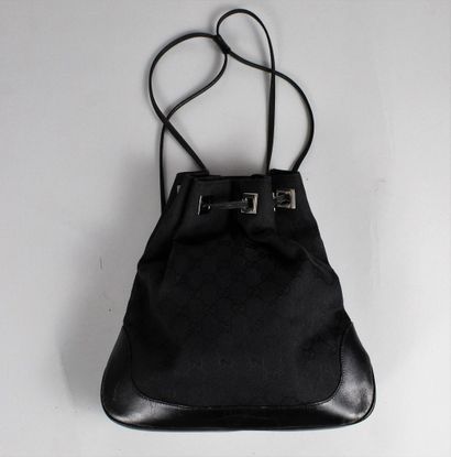  GUCCI 
 
Backpack model "Jackie" declination in smooth black leather and black canvas...