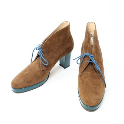 null 


DELAGE
Pair of brown suede shoes.