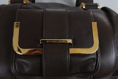 null MICHAEL KORS



Shoulder or hand bag in brown leather, one flap pocket on the...