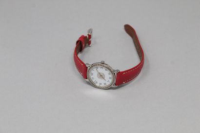  HERMES 
Ladies' wristwatch, round case, white dial with Arabic numerals. 
Signed...