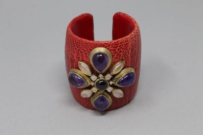  CAROLE GUEZ 
 
Red ostrich leg leather cuff, decorated with a stylized flower formed...