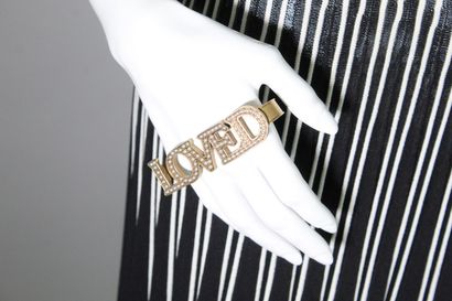 null GUCCI



Hand ring in gilded brass with the number "LOVED", entirely paved with...