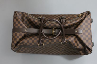 null 
LOUIS VUITTON



Travel bag model "Eole" with wheels, in checkerboard canvas...