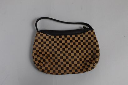 null LOUIS VUITTON 



Handbag "Damier sauvage" model in brown leather and printed...