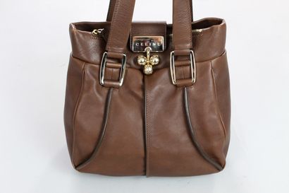 null CELINE 



Hand or shoulder bag in smooth brown leather and gold jewellery,...
