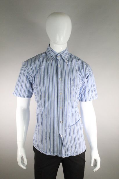  BALENCIAGA 
 
Short-sleeved shirt in cotton with thin blue stripes. One monogrammed...