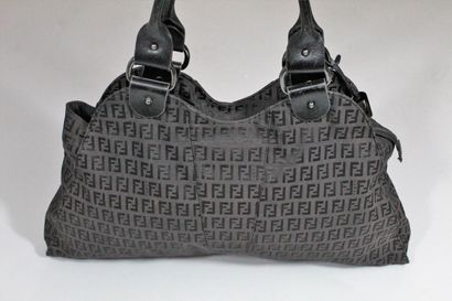 null FENDI



Hand or shoulder bag in "Zucca" canvas monogrammed and black leather....