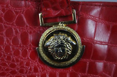 null GIANNI VERSACE COUTURE (circa 1990)



Handbag in red varnished calf with crocodile...